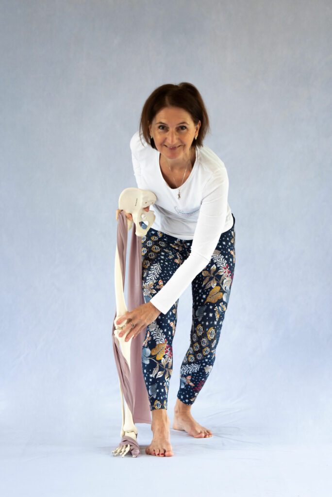 Woman performing a deep lunge stretch.